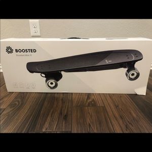 Brand new boosted mini skateboard